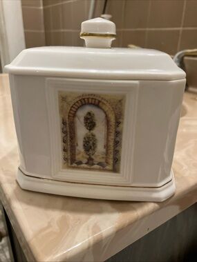 White Decorative Ceramic Storage Jar with Lid in Gold Trim by Cheri Blum.
